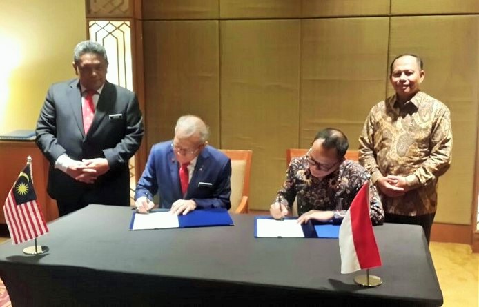Indonesia-Malaysia Tanda Tangani Kerjasama Penempatan TKI melalui Sistem Satu Channel/Foto dok. Naker