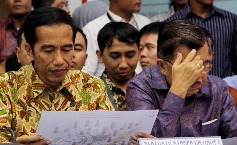 Pasangan Presiden dan Wakil Presiden Jokowi-JK tampak duduk bersandingan/Foto via okezone