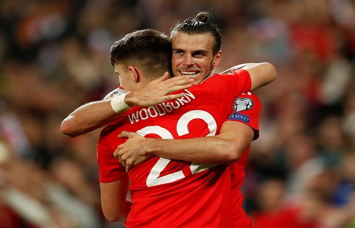 Gareth Bale dan en Woodburn. (Foto: Reuters)