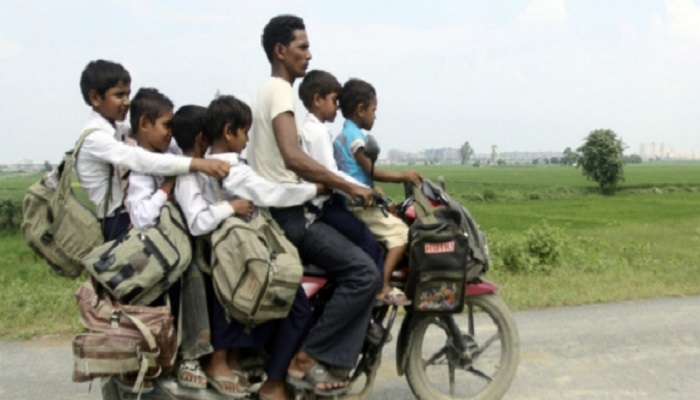 (Ilustrasi): Antarkan anak ke sekolah menggunakan kendaraan. Foto: metro.co.uk