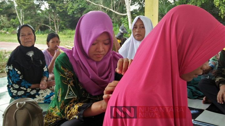 IPPNU Muara Kelingi Bantu Kesehatan 150 Warga Dengan ATS. (FOTO: NUSANTARANEWS.CO/Depati)