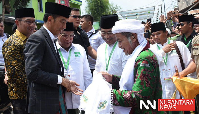Presiden Jokowi menghadiri pembukaan Munas Alim Ulama dan Kombes NU 2019 di Ponpes Miftahul Huda Al-Azhar di Citangkolo, Kota Banjar, Jawa Barat, Rabu (27/2/2019). (Foto: Selendang S/NUSANTARANEWS.CO)