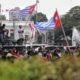 Pengibaran Bendera Bintang Kejora di depan Istana Negara. (FOTO: CNN Indonesia)