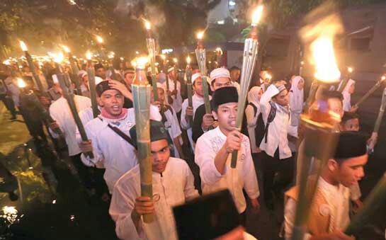 Pawai Obor Oleh Warga Sukamaju, Kecamatan Cilodong, Kota Depok. Foto Andika/Nusantaranews