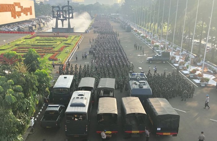 Polda Metro Jaya memastikan anggotanya tidak ada yang membawa senjata api dalam pengamanan aksi 299. Foto: Istimewa (WAG)