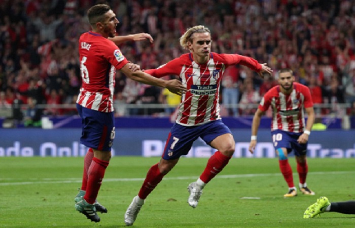 Antoine Griezmann selebrasi usai mencetak gol ke gawang Malaga dalam lanjutan La Liga Spanyol di Stadion Wanda Metropolitano pada Ahad (17/9) dinihari WIB. (Foto: Reuters)