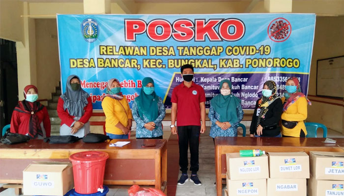 Pemdes Bancar Serahkan Bantuan Masker dan Disinfektan Bagi Warga Dalam Rangka Cegah Covid-19