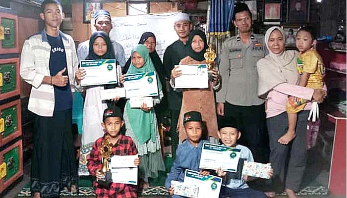 Polisi Baik Aipda M. Aliudin, S.H. Adakan Lomba Azan di TPQ Al-Hikmah